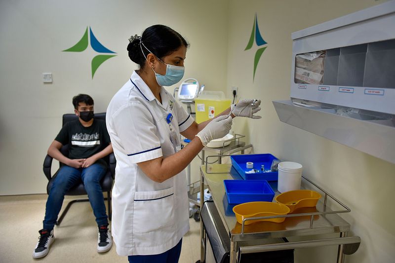Joel Aranjo gets vaccinated against COVID-19 at Al Barsha Health Centre in Dubai. 