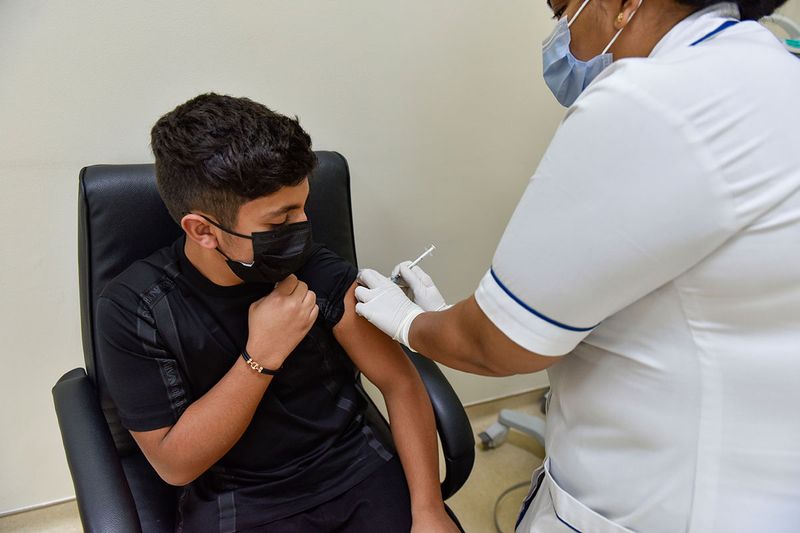 Keshav Verma gets vaccinated against COVID-19 at Al Barsha Health Centre in Dubai. It was announed on 13th May, 2021, by the UAE’s Ministry of Health and Prevention (MOHAP) that it has approved the emergency use of the Pfizer-BioNTech vaccine for the age group of 12 to 15 year olds. 