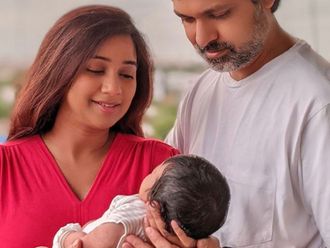 Shreya Ghoshal with her newborn and husband