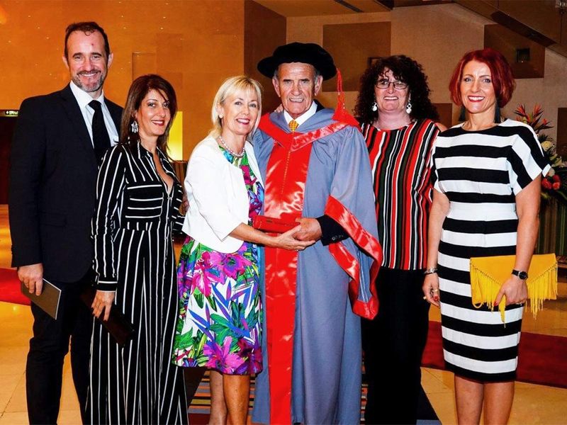 Colm McLoughlin celebrated with his family after receiving an Honorary Doctorate  in this 2017 file photo. His wife Breeda, son Niall and Sherly McLoughlin, Tyna McLoughlin and Amanda Jordan are seen in the photo. 