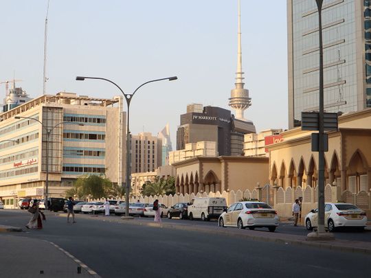 Stock Kuwait people expats skyline