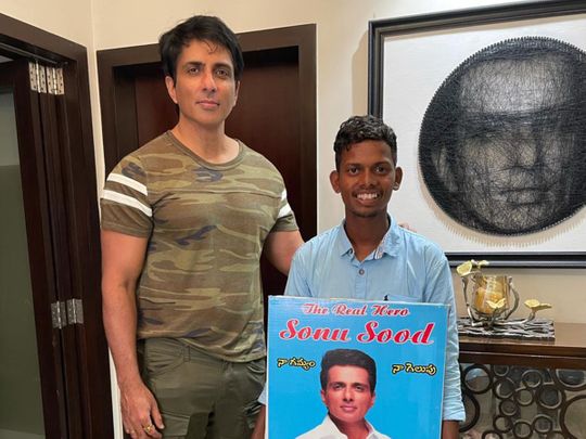 Sonu Sood with a fan who walked from Hyderabad to Mumbai to meet him