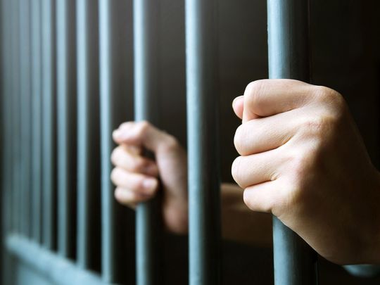 STOCK jailed prison handcuff crime