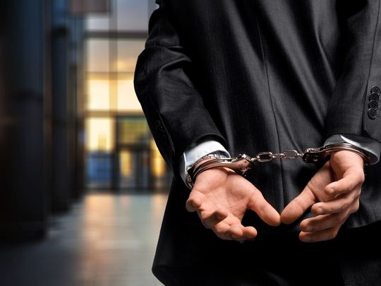 STOCK jailed prison handcuff crime
