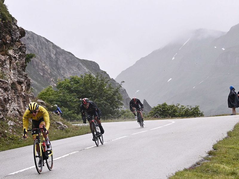 UAE Team Emirates' Tadej Pogacar wearing the Tour de France leader's yellow jersey in the Alps