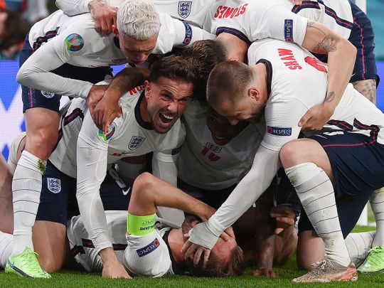 England celebrate Harry Kane's winner against Denmark