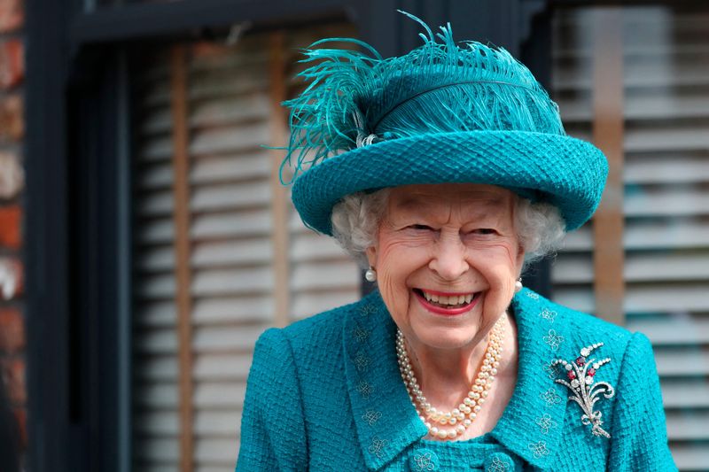 Britain's Queen Elizabeth II visits the set of the long running television series Coronation Street in Manchester, northwest England on July 8, 2021. 