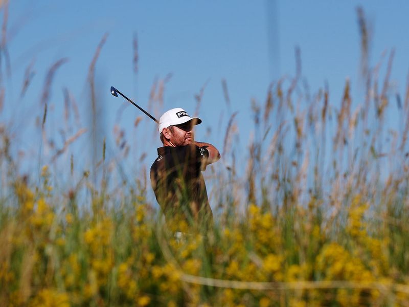 South Africa's Louis Oosthuizen leads the way at the halfway point of The Open