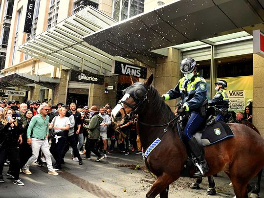 Australia covid protests police mounted lockdown