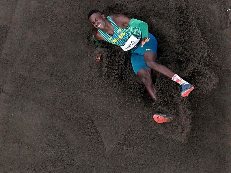 Brazil's Alexsandro Melo competes in the men's long jump qualification 