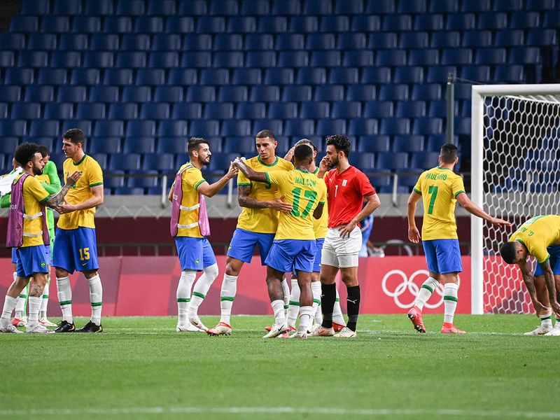 Brazil's players celebrate their win over Egypt at Saitama Stadium 