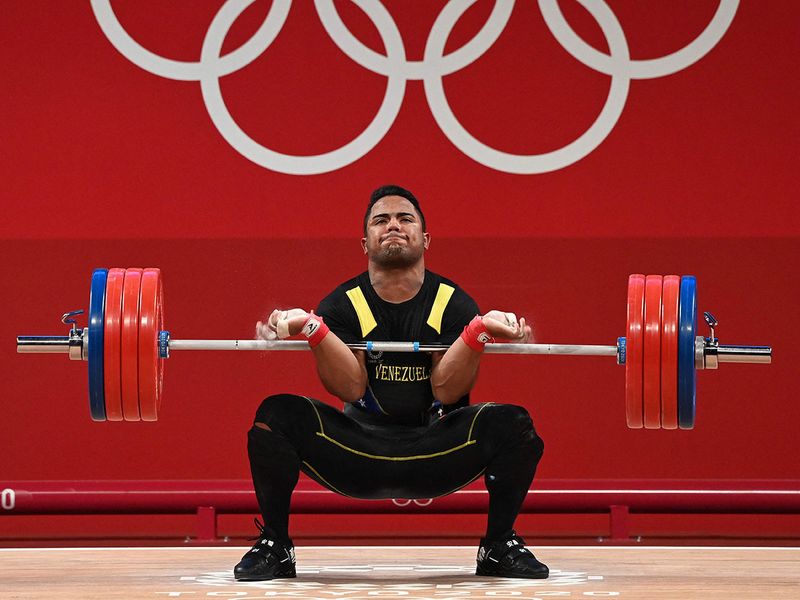 Venezuela's Keydomar Giovanni Vallenilla Sanchez competes in the men's 96kg weightlifting 