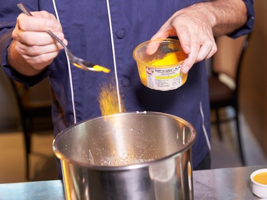 Making buttercream for macarons