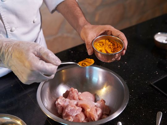 Marinating chicken - Add Turmeric Powder to the chicken 