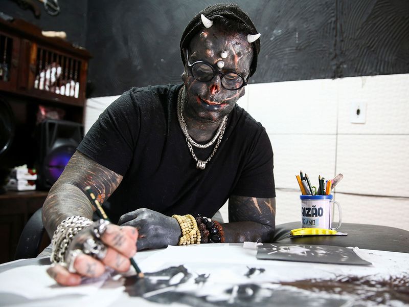 The sinister attracted me': Brazilian tattoo artist morphs into devil  look-alike | News-photos – Gulf News