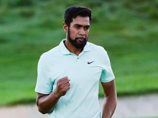 Tony Finau celebrates after winning The Northern Trust at Liberty National Golf Course 