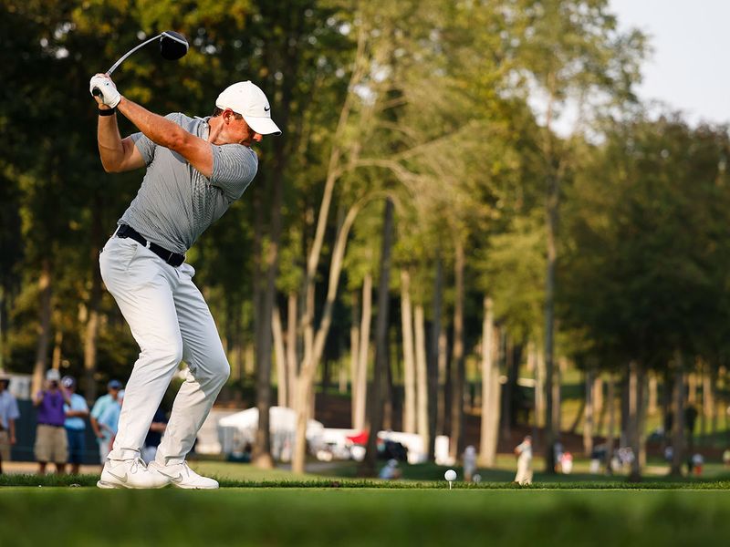 Rory McIlroy plays his shot from the 15th tee during the first round of the BMW Championship 