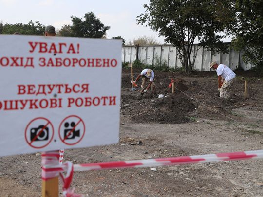 A view of the mass graves site discovered on an abandoned area near the city airport where until recently was a dump in Odessa. 