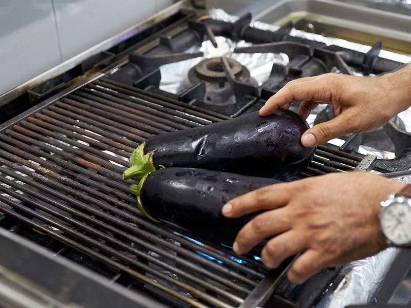Chargrill the eggplant on open flame 