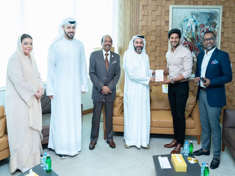 Dulquer Salmaan receiving his UAE Golden Visa