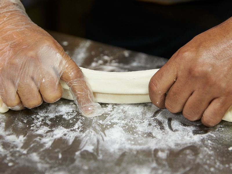 Fold the dough inward (one inch fold)
