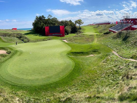 Temporary grandstands are set up around the 18th hole at Whistling Straits Golf Course in preparation for the Ryder Cup 