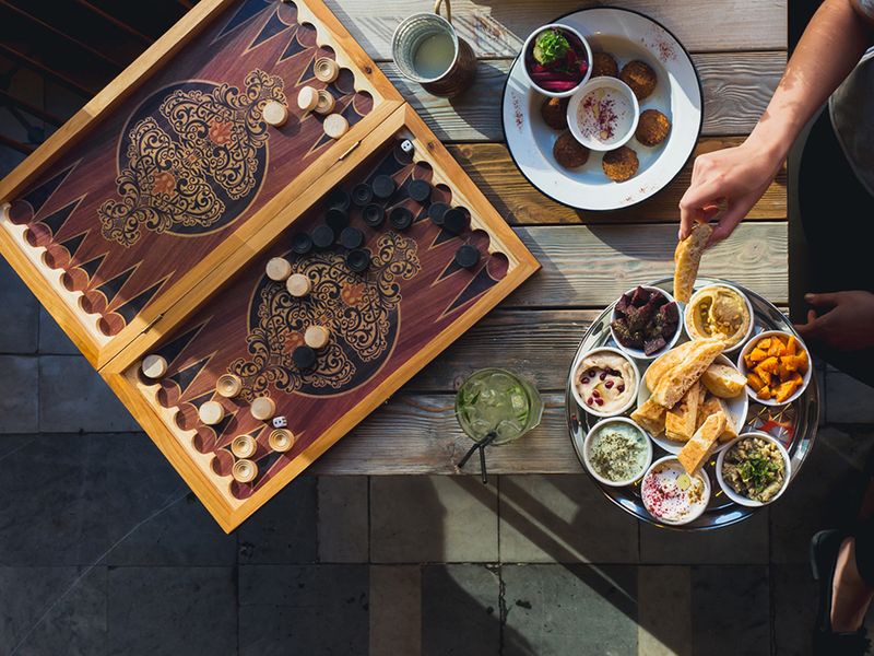 A traditional mezze platter served with small bowls of appetizers 