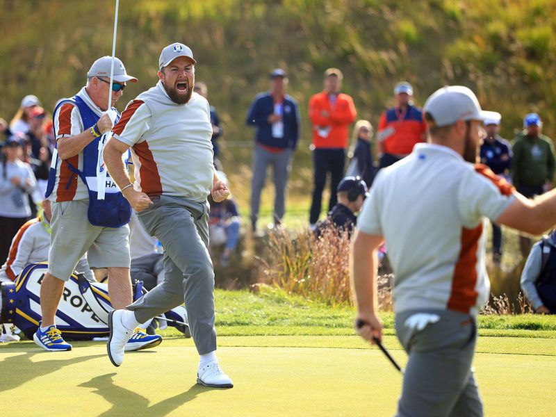 Shane Lowry of Team Europe celebrates on the 14th green 