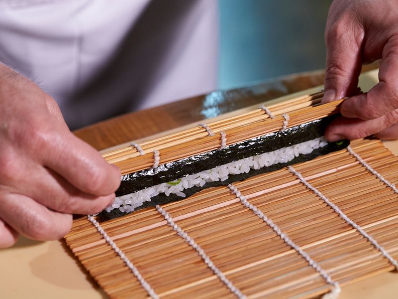 Making sushi rolls 