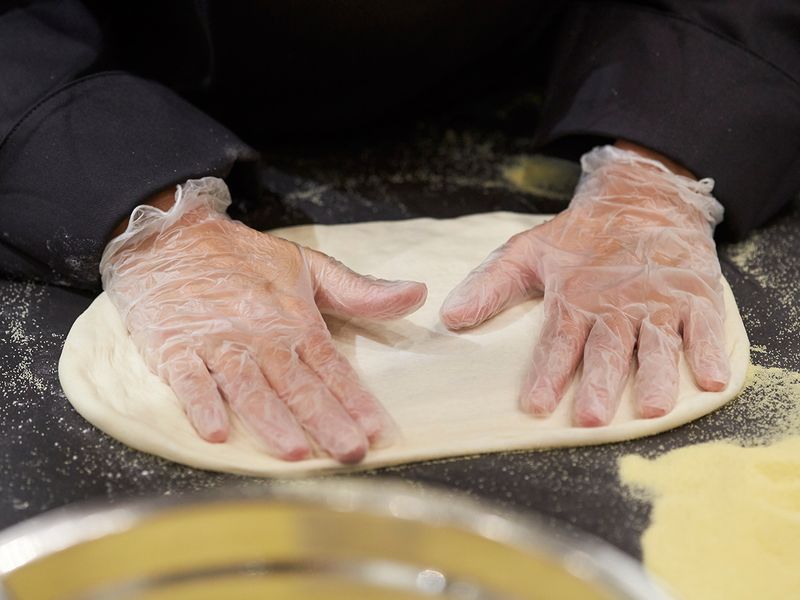 Stretch the dough further 