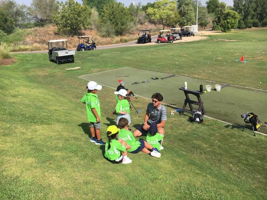 A group of young students as part of the Jumeirah Golf Estates Junior Programme at the Peter Cowen Academy.