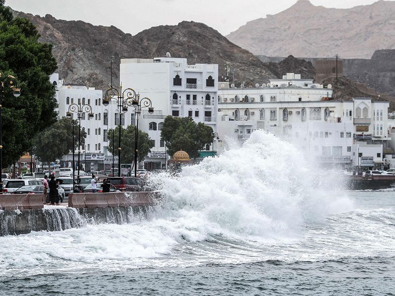 High waves break on the Mutrah sea side promenade in the Omani capital Muscat on October 2, 2021, as the Shaheen tropical storm hits the country.
