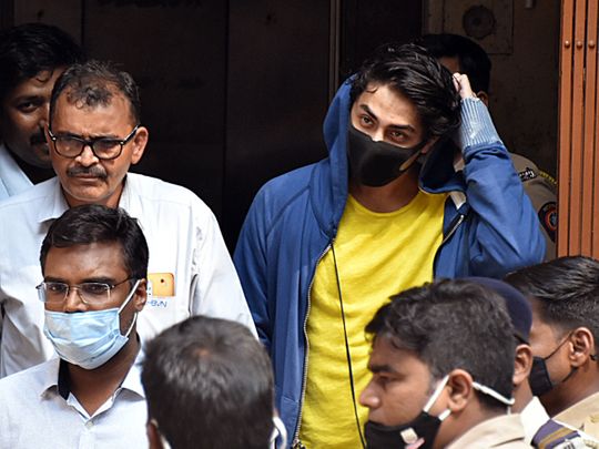 Maharashtra, Oct 4 (ANI): Bollywood actor Shah Rukh Khan's son Aryan Khan along with other accused leaves the NCB office after an inquiry as he is arrested in an allegedly drug-related case, in Mumbai on Sunday