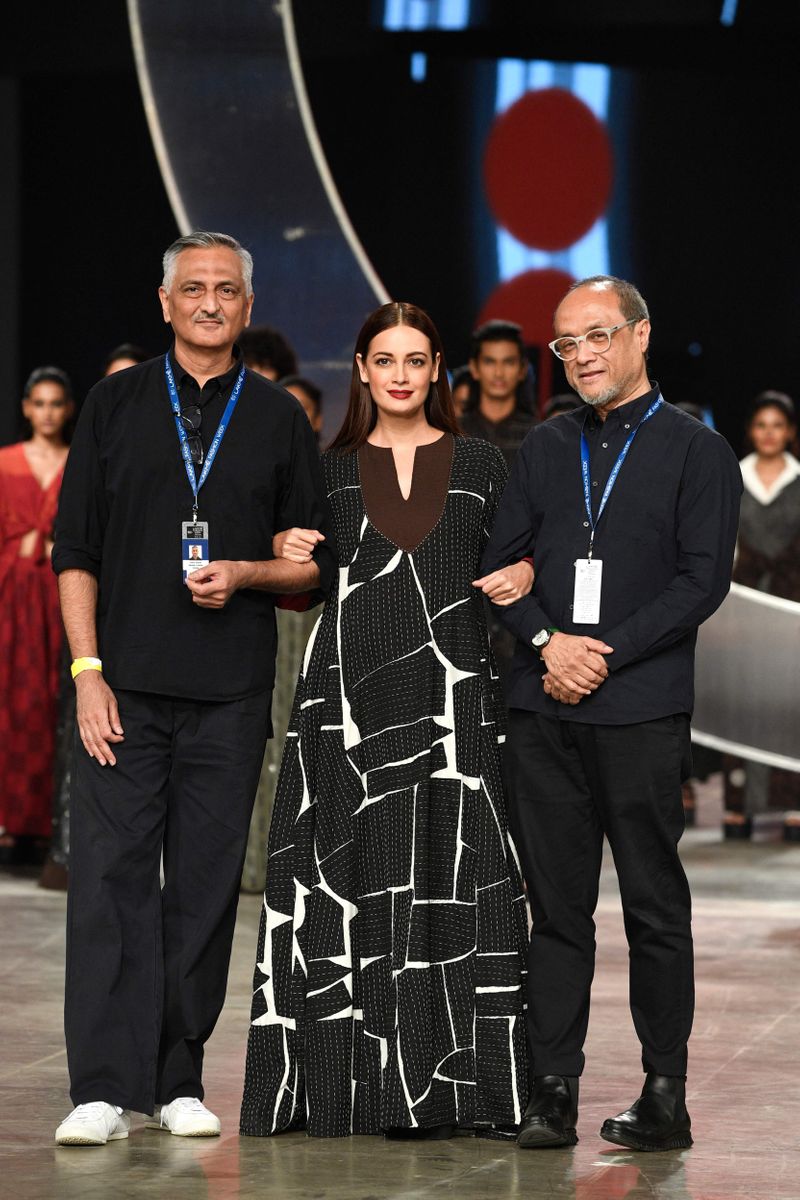 Bollywood actress Dia Mirza presents a creation by Indian designers Abraham and Thakore during the ‘FDCI x Lakme Fashion Week’ fashion show in Mumbai on October 8, 2021