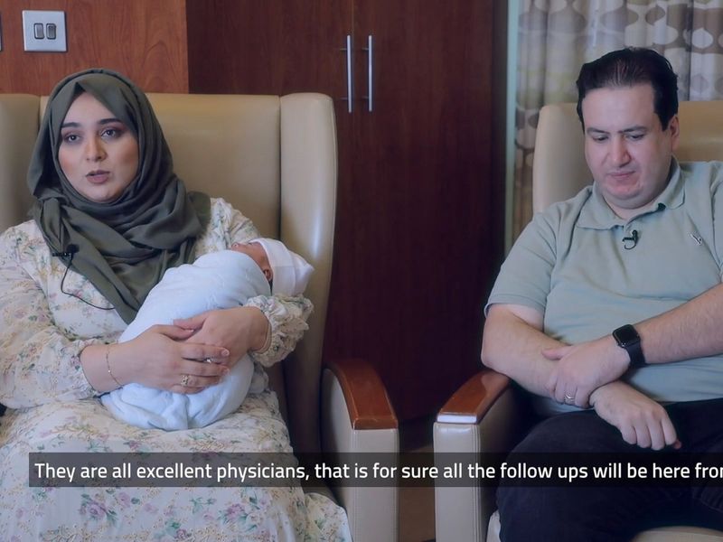 Screen-grab of hospital's video of Baby Adel with mom Taqwa and dad Samer