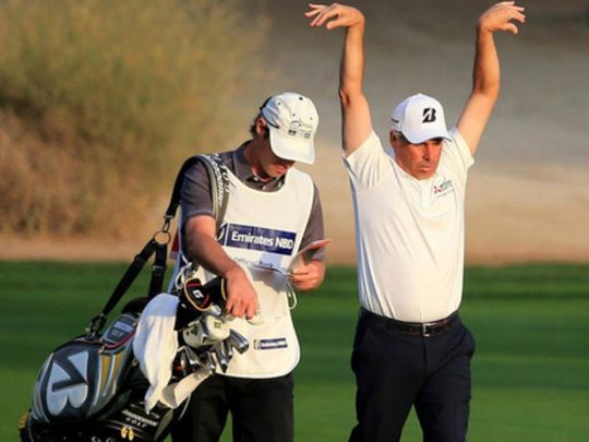 Stephen Deane with Fred Couples at the Dubai Desert Classic