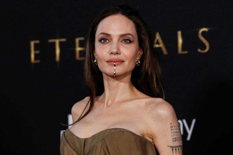 Cast member Angelina Jolie poses at the premiere for the film 