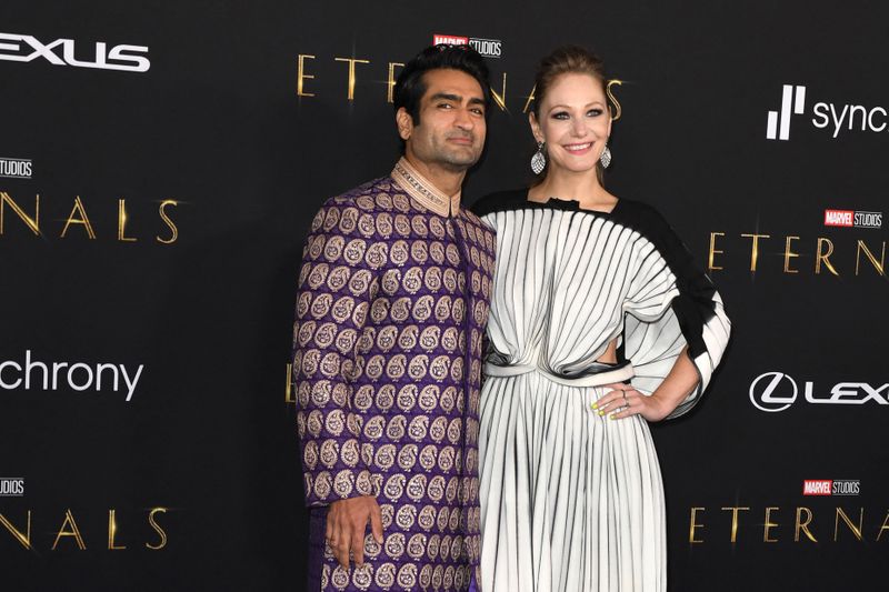 Pakistani-US actor Kumail Nanjiani and wife US writer Emily V. Gordon arrive for Marvel Studios' 