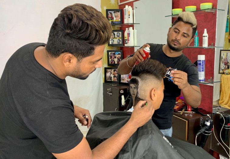 Copy of 2021-10-20T010444Z_643836860_RC2P7Q90ELFE_RTRMADP_3_INDIA-BARBER-HAIRCUT-1634715403832