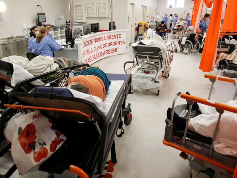 Medical professionals assist COVID-19 patients in the overcrowded intensive care unit at the Emergency Hospital 
