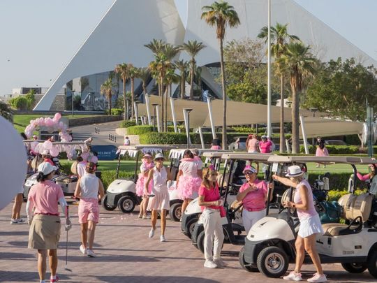 The teams assemble ahead of the Pink Day event at Dubai Creek Golf & Yacht Club