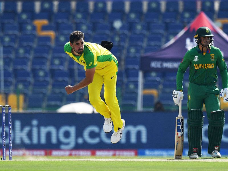Australia's Mitchell Starc bowls to South Africa's Quinton de Kock in Abu Dhabi