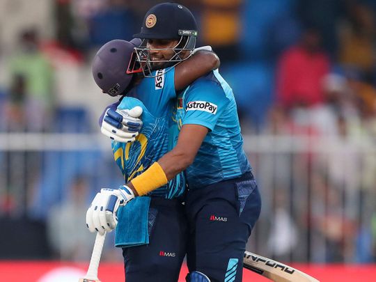 Sri Lanka's Charith Asalanka and Dasun Shanaka celebrate after defeating Bangladesh in Sharjah