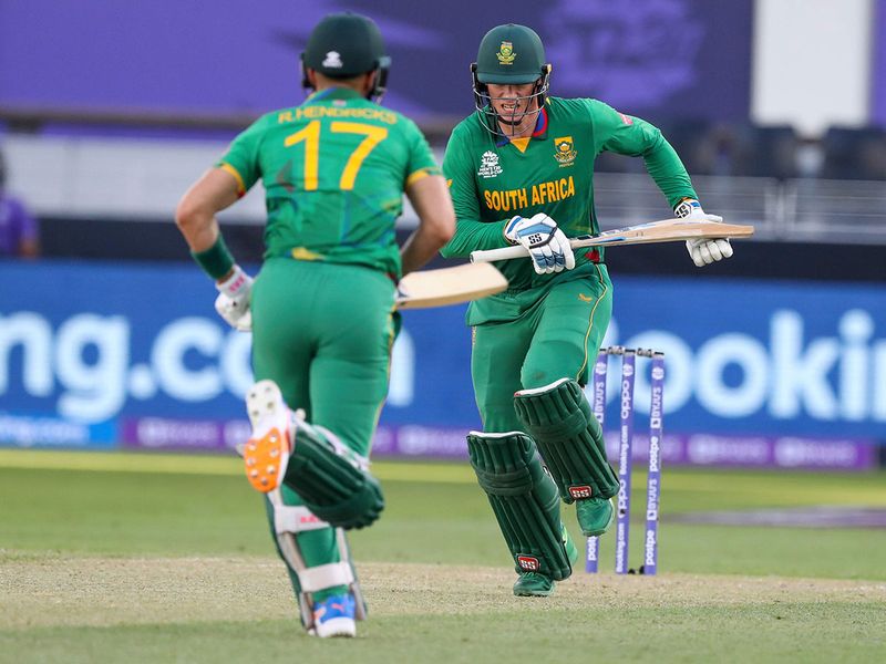 South Africa's Rassie van der Dussen, right, and Reeza Hendricks run between the wickets 
