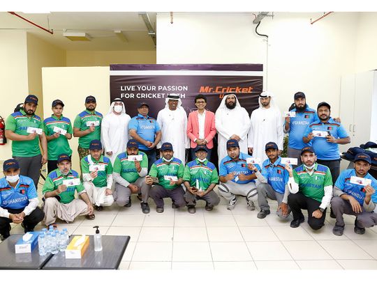 Anis Sajan, the Vice-Chairman of Danube Group, distributes Twenty20 World Cup tickets to blue collar workers at Jebel Ali Free Zone Area