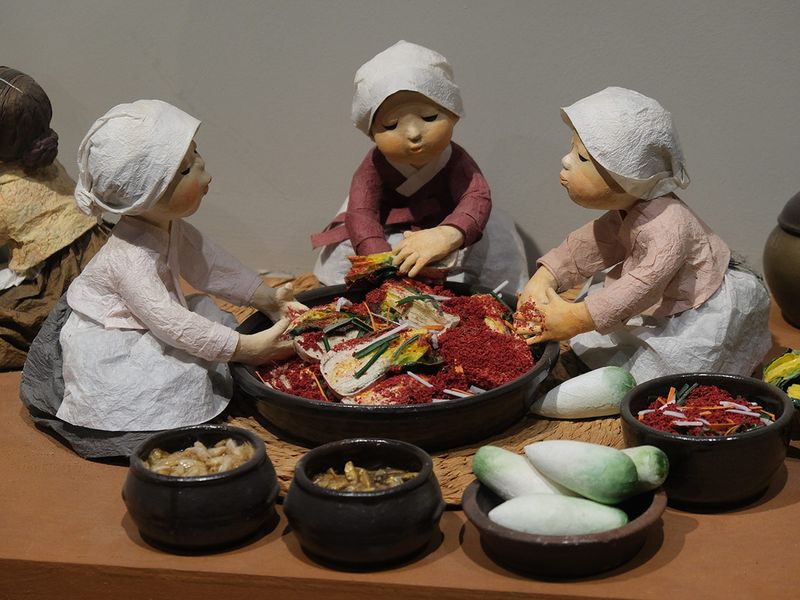 Clay dolls depicting kimchi making scene at National Folk Museum of Korea