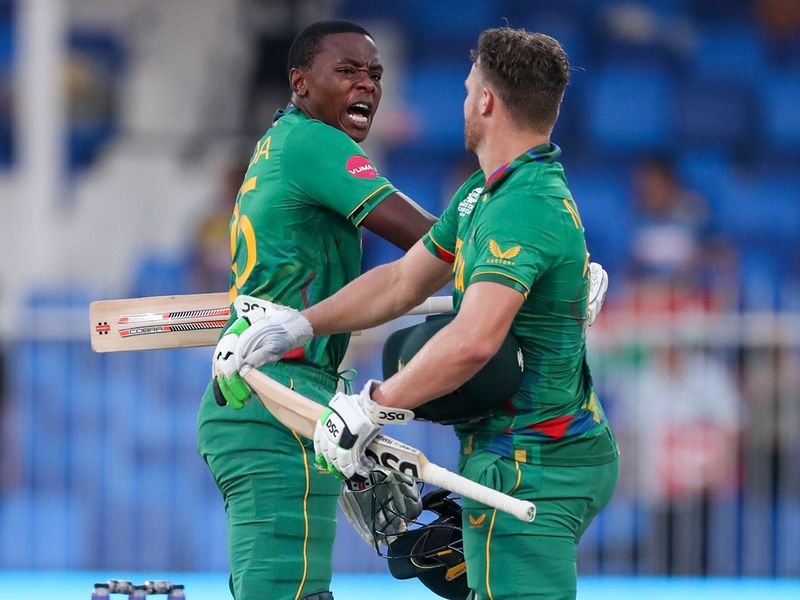 South Africa's David Miller celebrates with teammate Kagiso Rabada after defeating Sri Lanka in their Twenty20 World Cup 