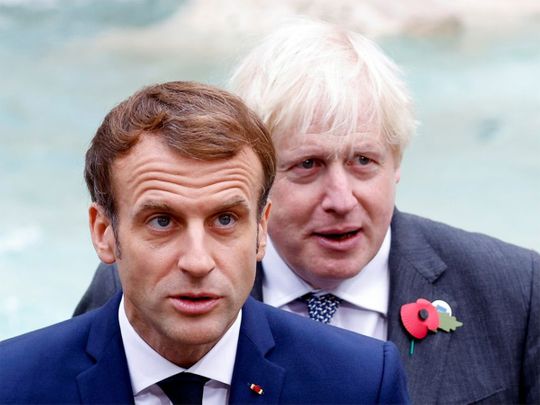 Britain's Prime Minister Boris Johnson (right) and French President Emmanuel Macron