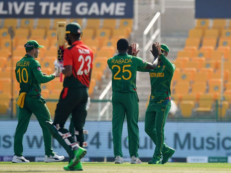 South Africa's Kagiso Rabada celebrates with teammates after the dismissal of Bangladesh's Mohammad Naim 
