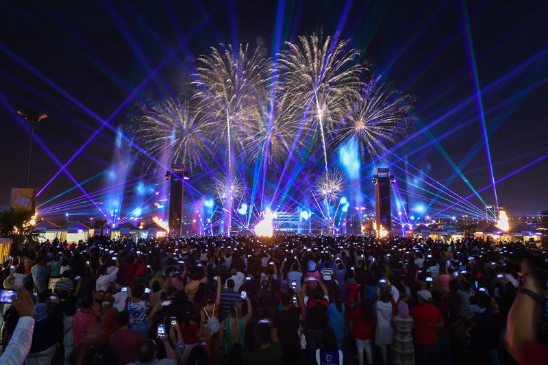 People enjoy fireworks on the occasion of Diwali at Dubai Festival City. 
